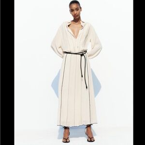 CONTRAST SEAM PIN TUCK MIDI SKIRT